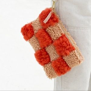 Orange and Peach Checkered Shearling Pouch
By Primecut